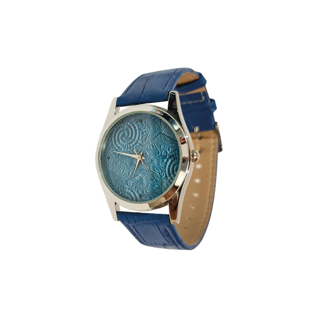 Rellotge de canell blau abstracte amb corretja de pell blava